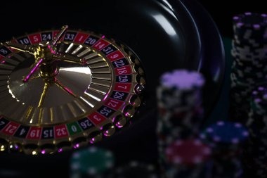 Mobile phone showing live roulette table interface with bet placement buttons